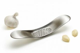 Stainless steel garlic rocker
